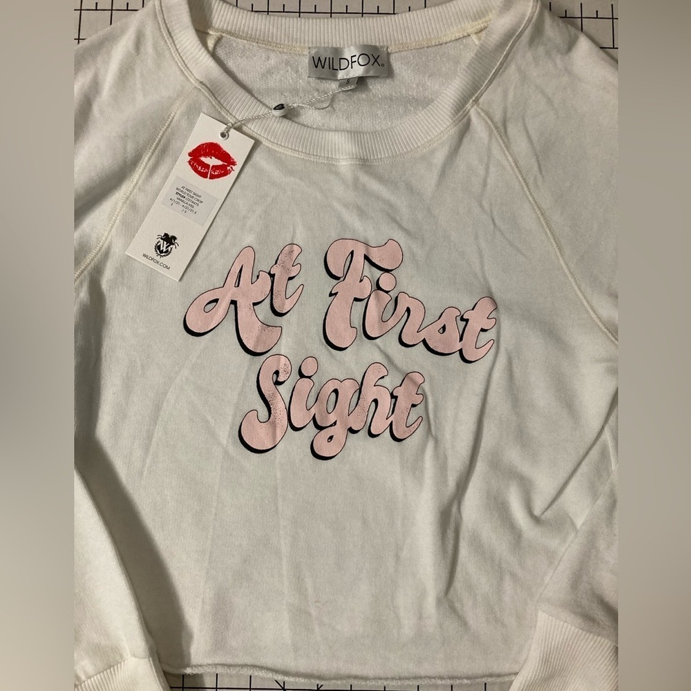 NWT WildFox Women’s Size Small Vanilla At First Sight World Tour Crop Shirt